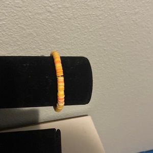 Orange and yellow clay bead bracelet